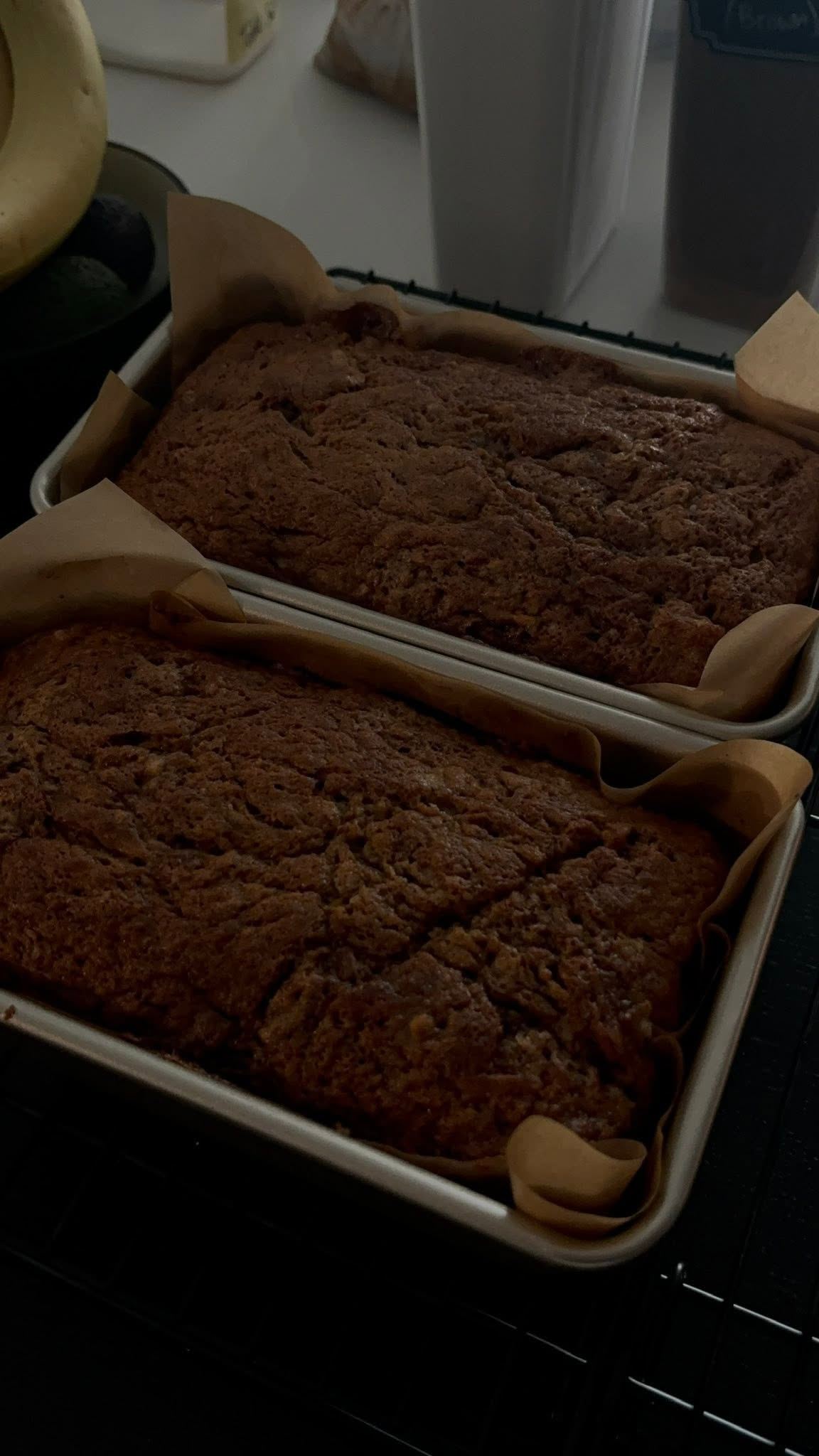 Two loaves of banana bread fresh from the oven